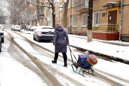 Одессу снова накрыло белой пеленой (фоторепортаж)