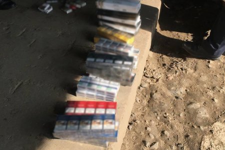 На рынке в селе Раздельнянского района мужчина устроил незаконную торговлю сигаретами (фото)