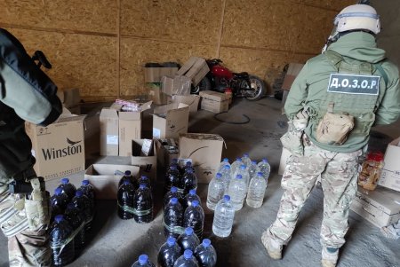 Спиртное в канистрах на полмиллиона гривен изъяли в ходе обысков на юге региона (фото)