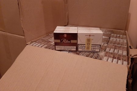 Почти 40 тысяч пачек сигарет неизвестного происхождения нашли в микроавтобусе у жителя Раздельной (фото, видео)