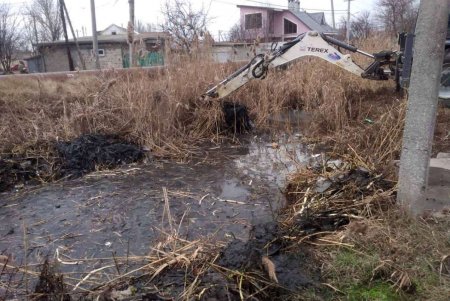 Коммунальщики за неделю очистили десятки улиц, дождеприемников и каналов (фото)