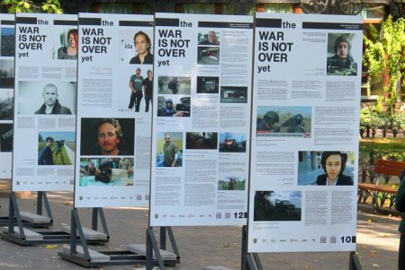 В Городском саду открылась фотовыставка The War Is Not Over Yet (фоторепортаж)