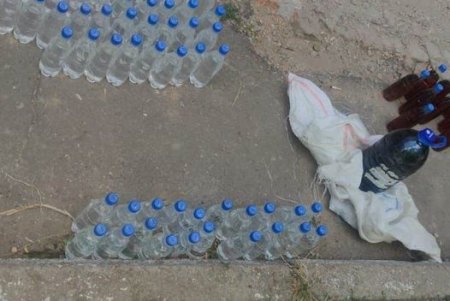 Смешивали этиловый спирт с водой: четыре жителя Одессы организовали незаконный бизнес по продаже фальсификата