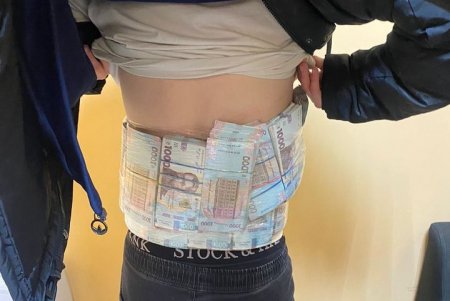 В пункте пропуска «Орловка» обнаружили пассажира, который спрятал под одеждой 2,2 миллиона гривен (фото)