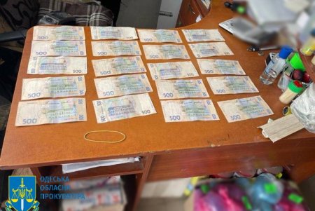 В Одесской области сотрудник полиции требовал от военнослужащего 10 тысяч гривен за возврат техпаспорта на авто (фото)
